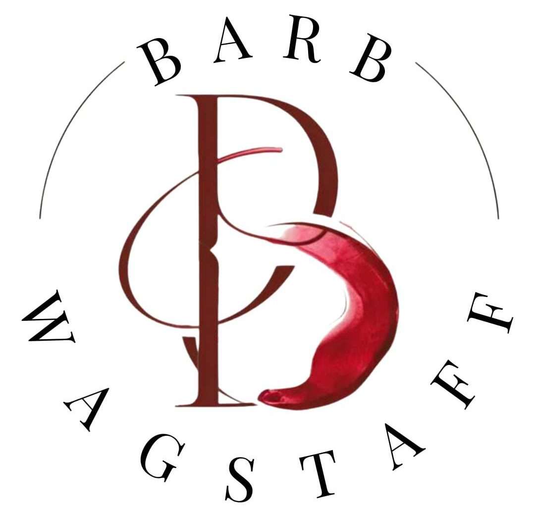 Barb Wagstaff written in a circle with a B in the center of a white background and wine spilling up the B